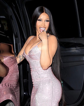 Cardi B Sizzles in Revealing Outfit: Embracing Sexy Curves at Charity Gala!