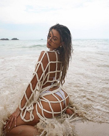 Barely There Bliss: Cindy Prado’s White Bikini Eruption on the Sandy Shores!