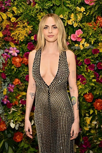Cara Delevingne Steals Spotlight in Revealing See-Through Dress: Braless Breasts and Nipples on Display!